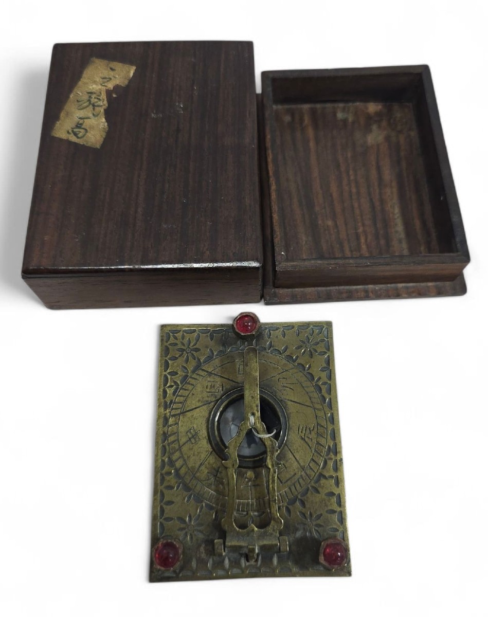 A 19th-century Asian Portable Bronze Sundial Adorned With Semi-precious Stones.