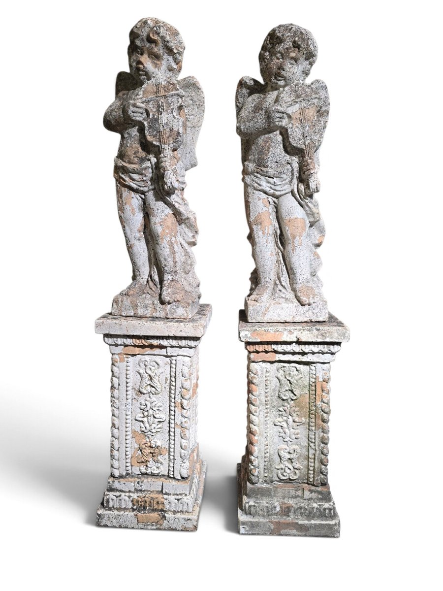 Paire de sculptures  en terre cuite italienne du XIXe siècle représentant des chéru