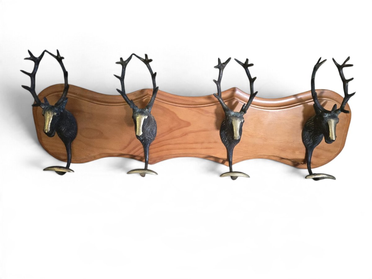 Vintage Spanish Wall-mounted Coat Rack With A Hunting Theme, Featuring Four Deer Heads Made Of Br