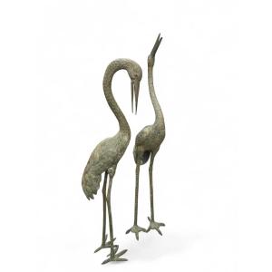 Paire de grandes sculptures de hérons en bronze patiné, XXe siècle, 180 cm