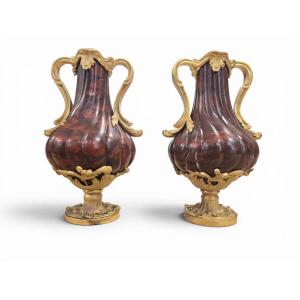 Pair Of French Vases Made Of Turned Red Marble With Gilded Bronze Mounts