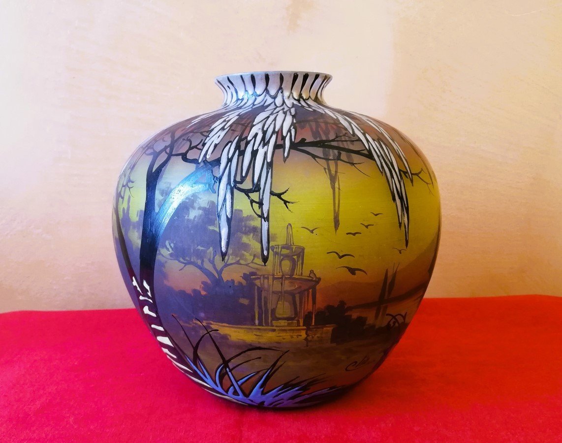 Vase boule signé CLIO 