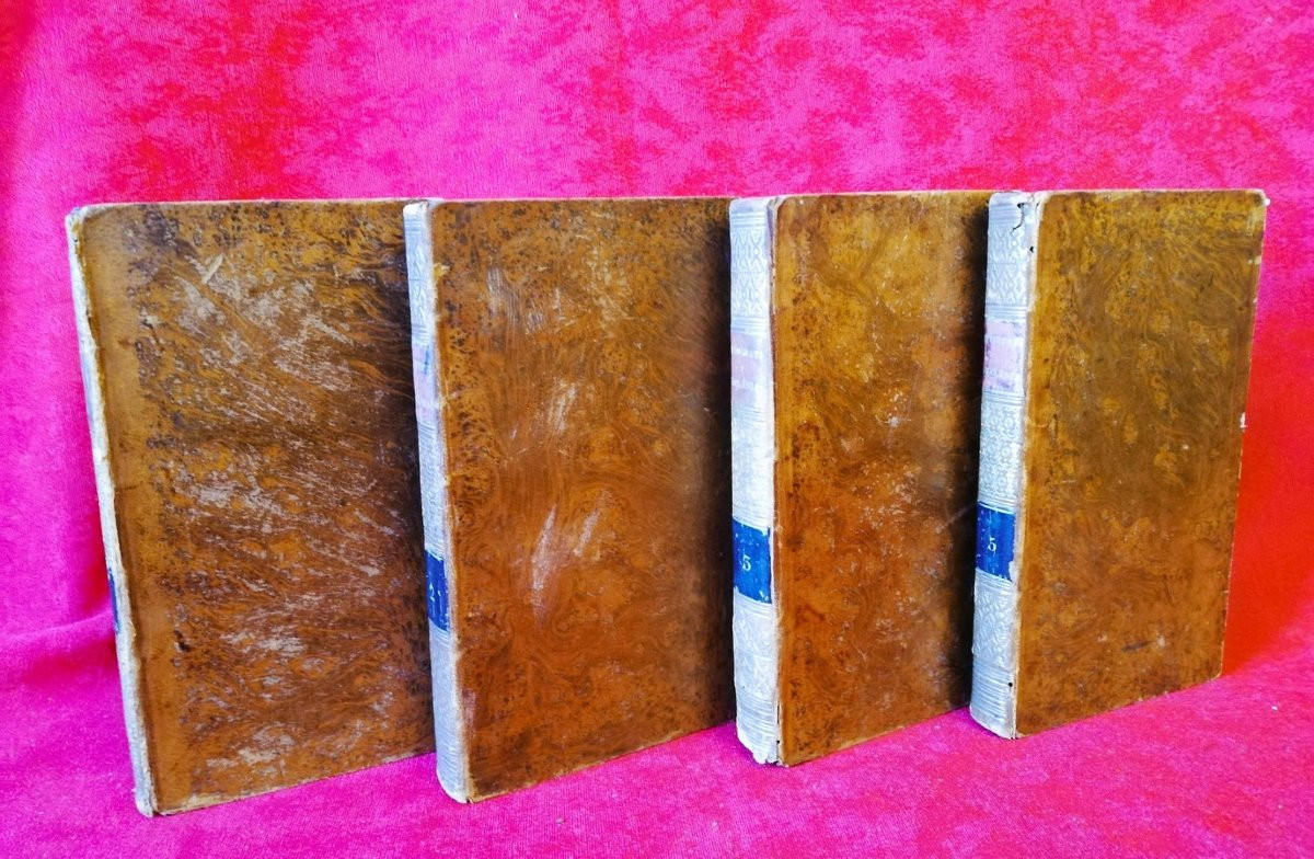 Four Leather-bound Books -photo-2