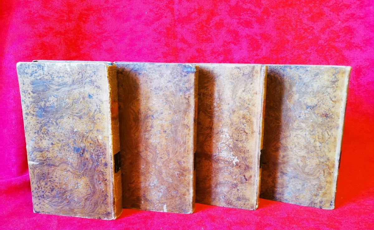 Four Leather-bound Books -photo-3
