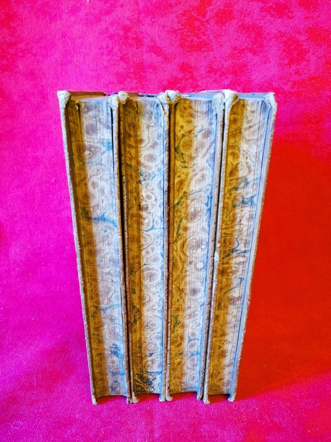 Four Leather-bound Books -photo-7