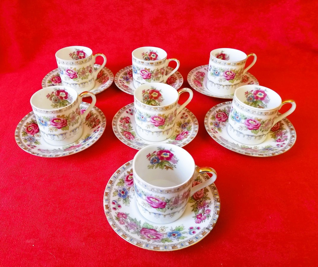 Seven Cups With Their Porcelain Saucers 