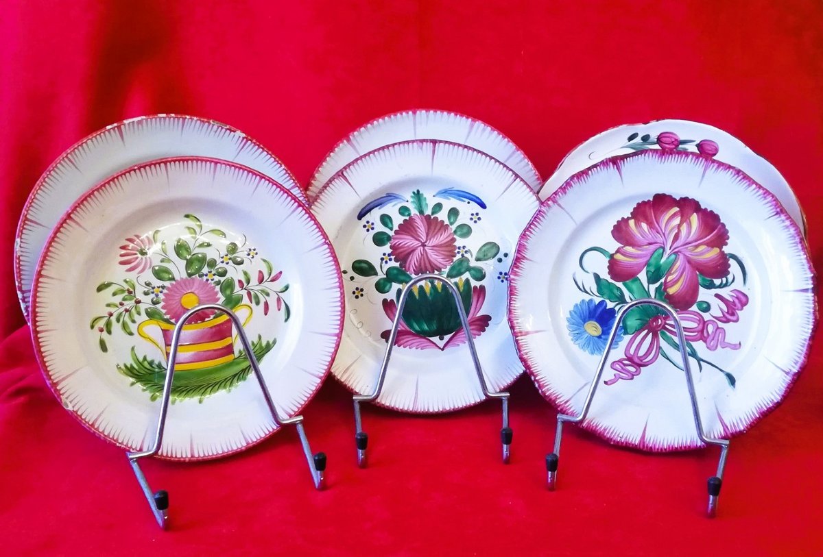 Suite de six assiettes en faïence de l'Est de la France