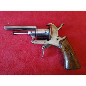 Revolver à barillet à broche 