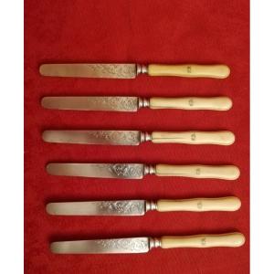 Six couteaux argent 