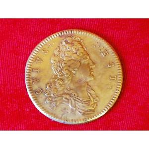 Médaille en laiton doré 