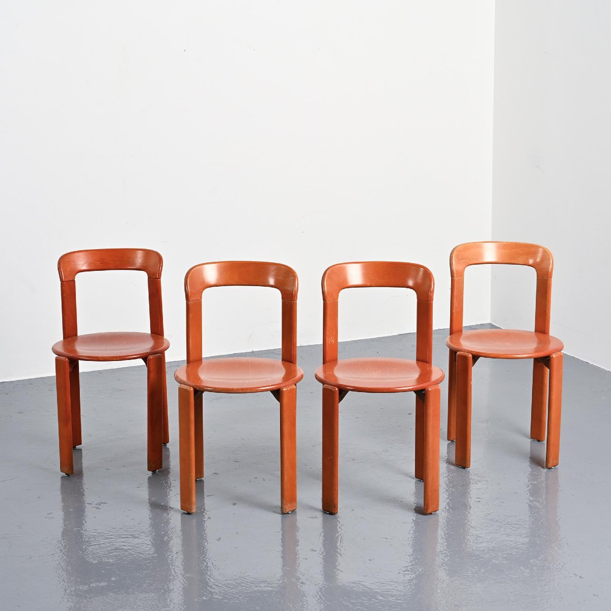 Rey Chairs In Red-stained Beech By Bruno Rey