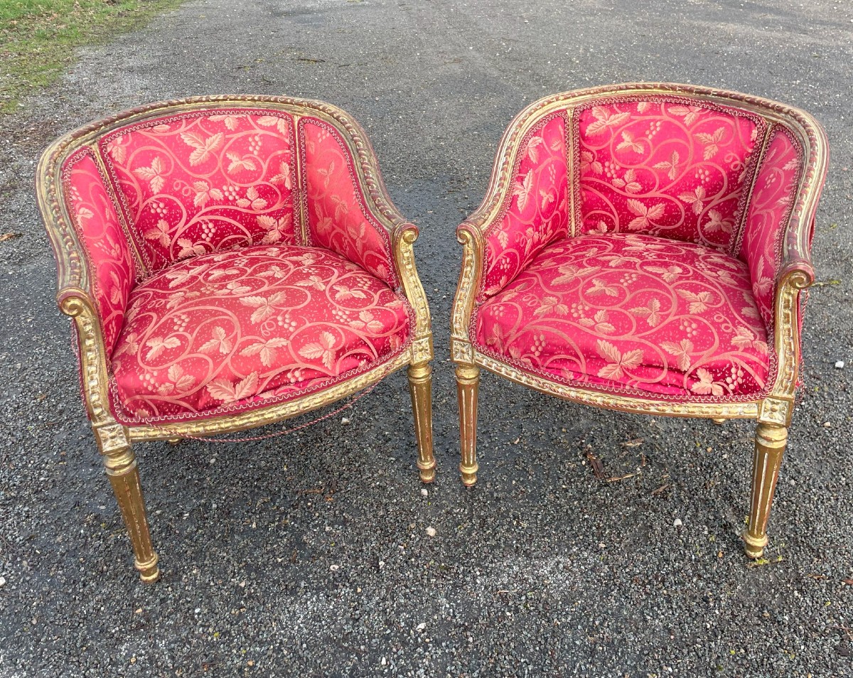 2 Fauteuils en bois massif doré et tissus rouge