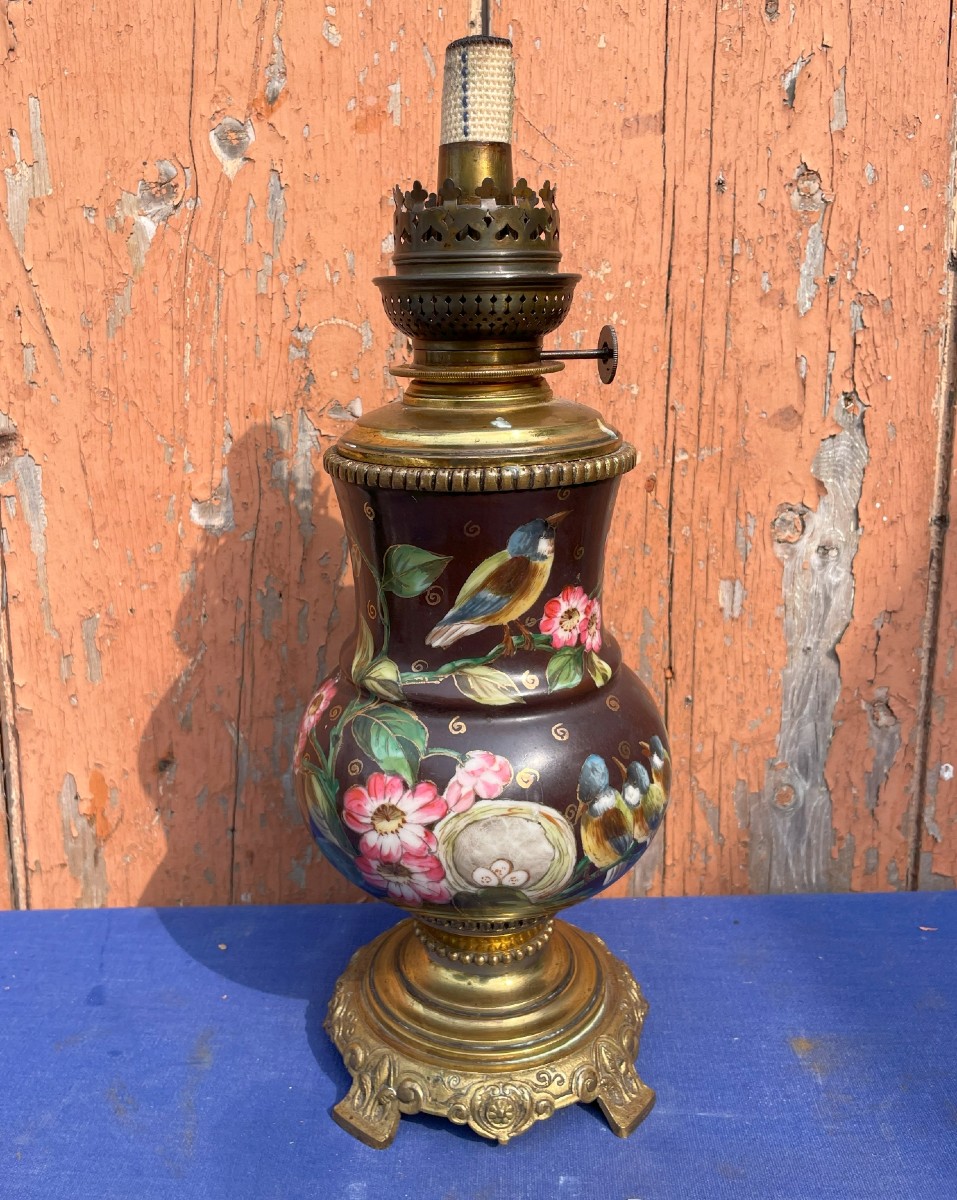 Lampe 1880  en bronze et porcelaine et peinture " l'oiseau "