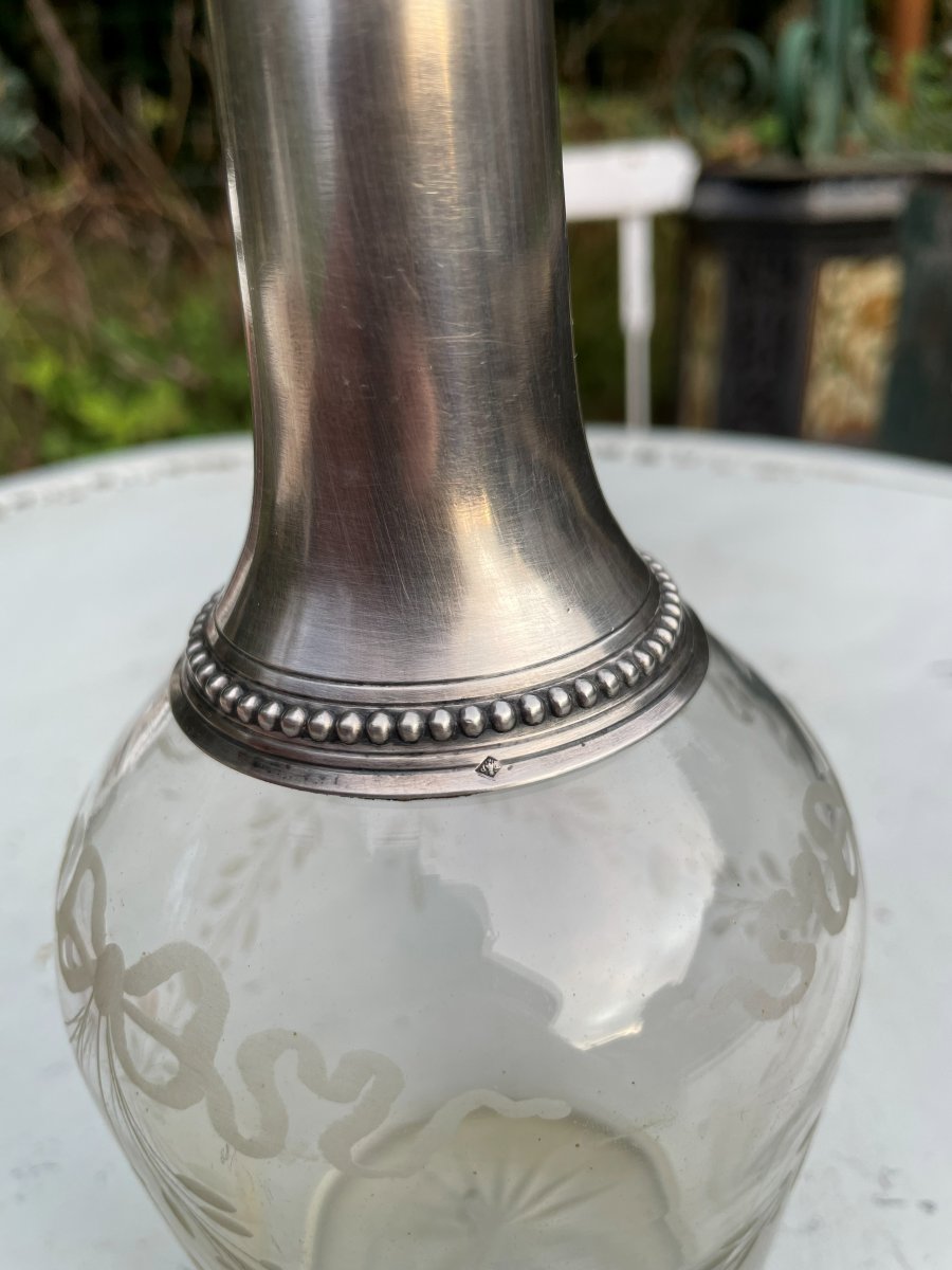 Bouteille en verre et en argent -photo-1