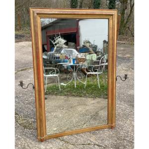Miroir doré et sobre 