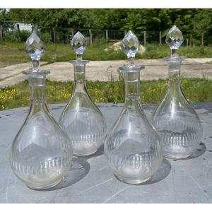 4 Complete And Unbroken Glass Carafes
