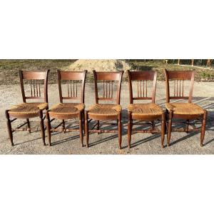 5 Chaises de campagne paillées .