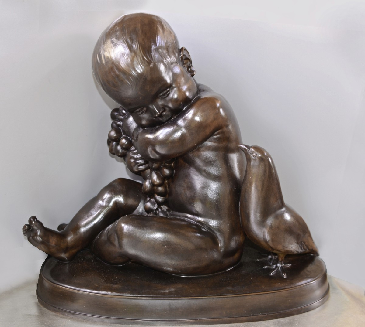 Lucienne Heuvelmans "Bacchus Enfant au Pampre et à l'Oiseau" Bronze vers 1930 Ed. Colin