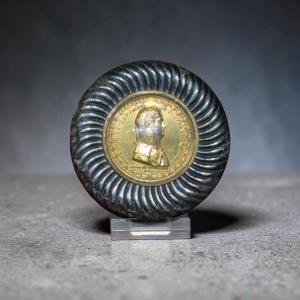 A Circular Box Decorated With A Central Medallion Depicting A Bust.