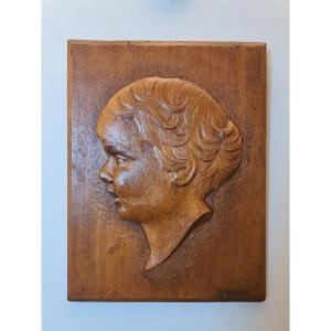 Jean Degeilh, Child Profile, Carved Wood Panel, 20th Century.