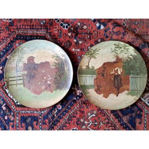 Cycling In 1900, Pair Of Large Terracotta Plates With Painted Designs And Collages, 1900.