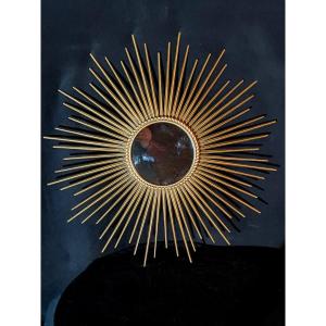 Grand miroir soleil doré Chaty Vallauris. 