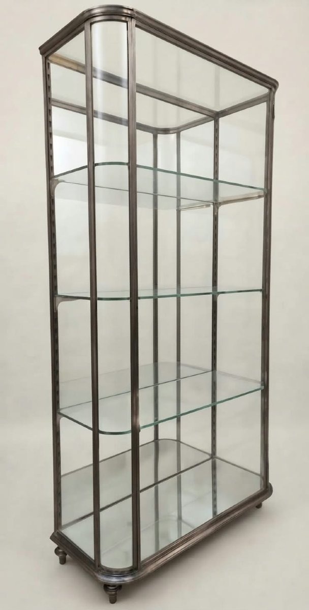 Early 20th-century Storefront Display Cabinet With Curved Sides Made Of Polished Steel.