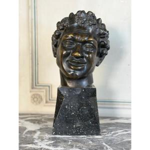 Tête de faune esquissant un sourire, bronze d’après l’antique, XIXème siècle 