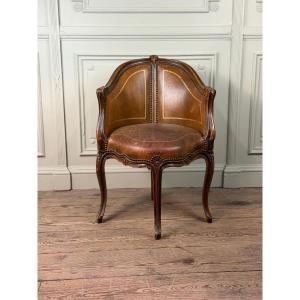 Fauteuil de bureau de style Louis XV en bois sculpté, cuir brun, vers 1920