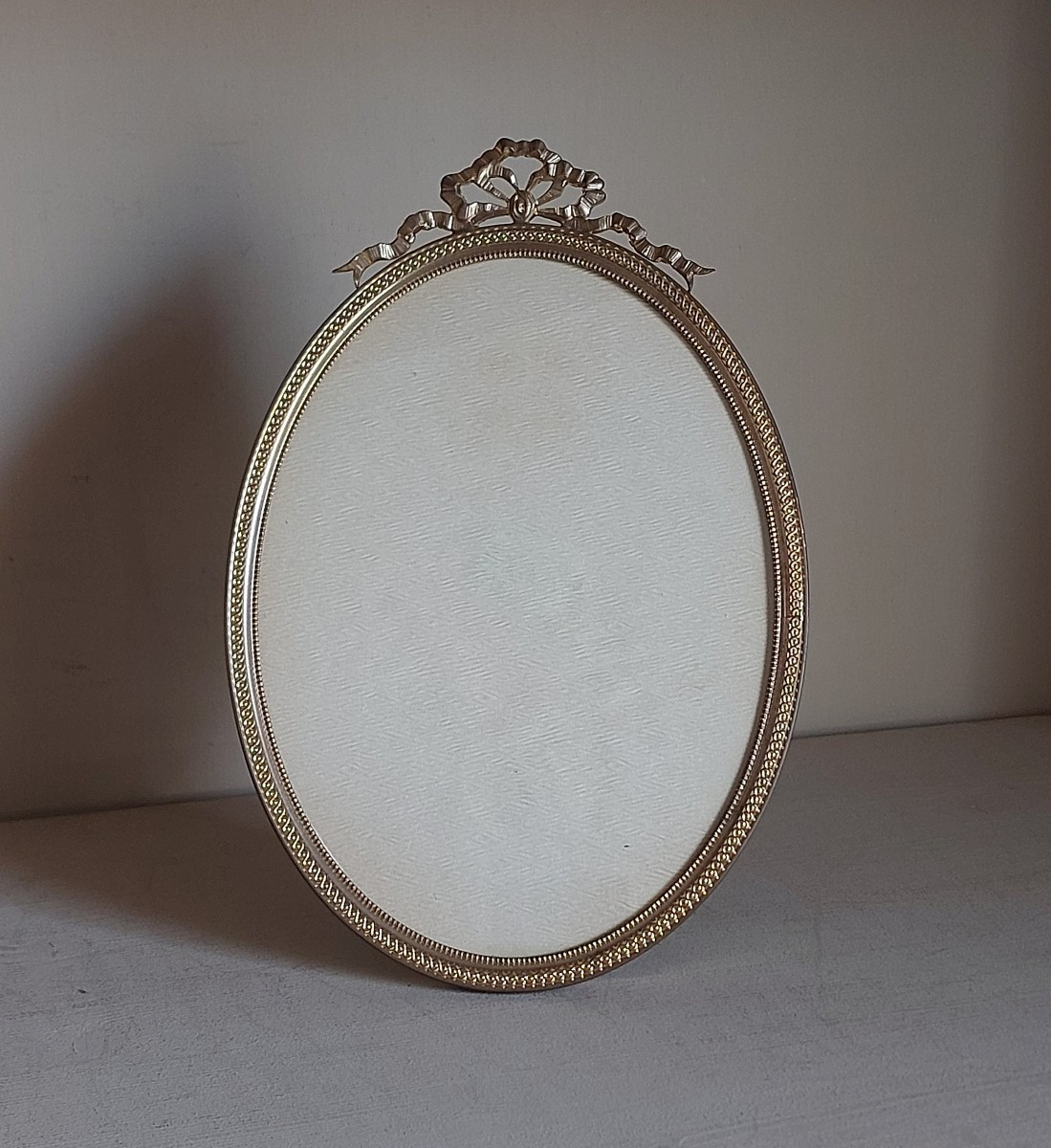 Cadre bronze doré de style Louis XVI 