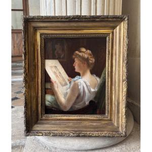 Young Woman Looking At A Watercolor, C. 1900