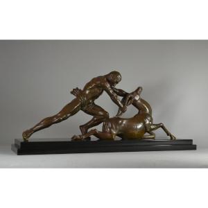GHANU GANTCHEFF grand groupe en bronze art déco. Homme et antilope
