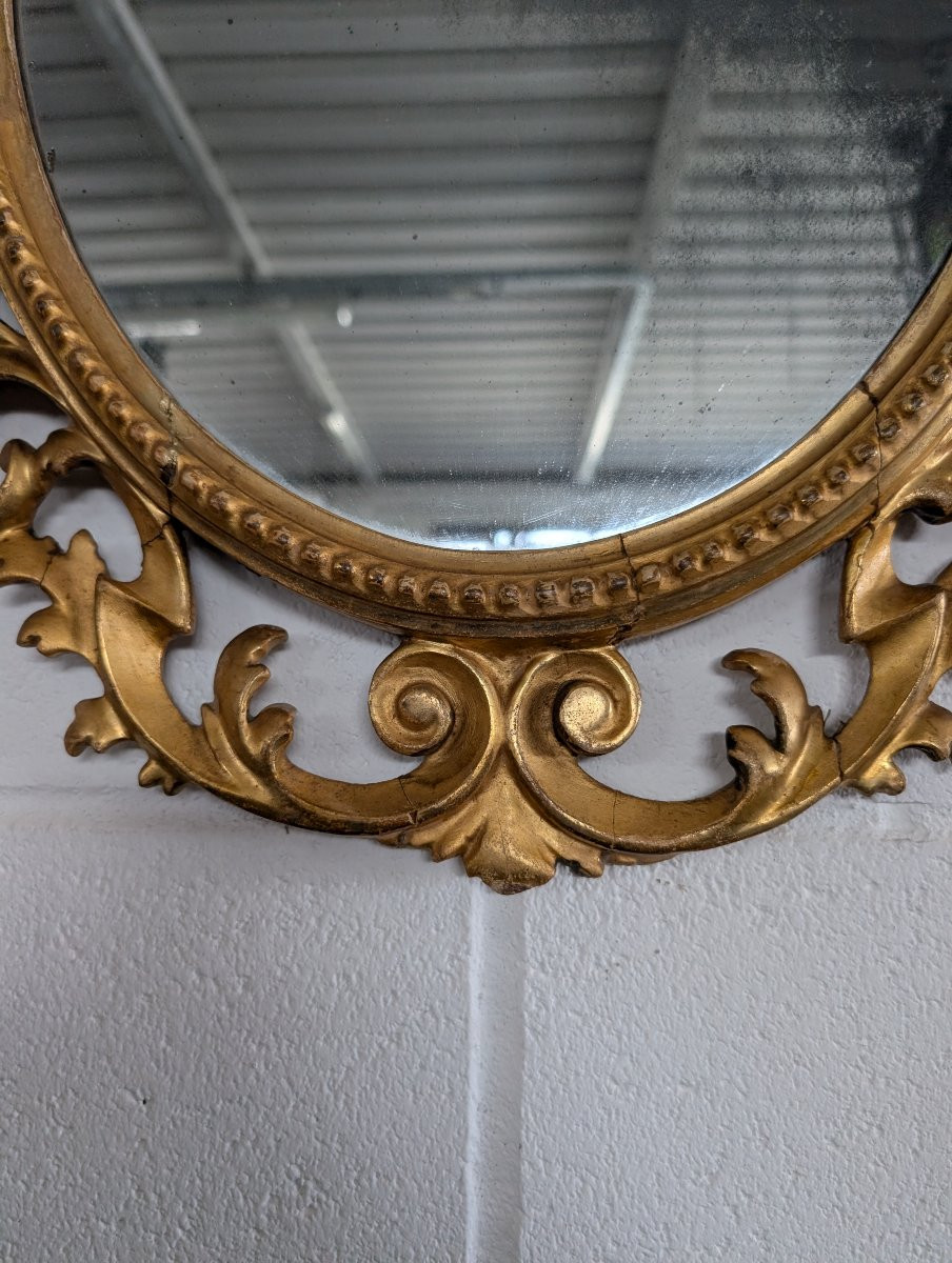 Miroir ovale florentin en bois sculpté et doré à la feuille d’or – milieu XIXe siècle-photo-2