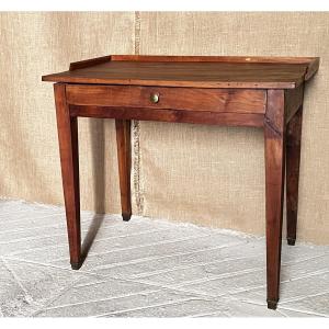 Table à écrire à plateau cabaret, époque Directoire, merisier massif;