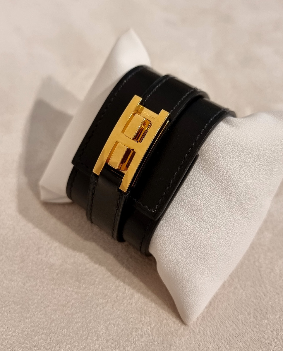 Hermès Bracelet Manchette modèle DRAG plaqué or et cuir noir-photo-4