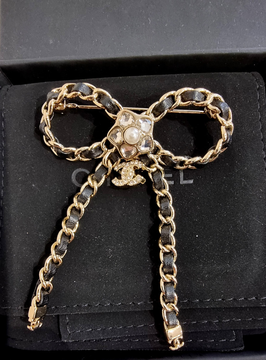 CHANEL BROCHE NOEUD Métal Doré & Cuir Tressé-photo-1