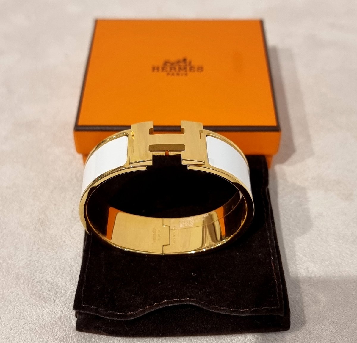 Hermès Clic H Bracelet In Gold-plated Metal And White Enamel 