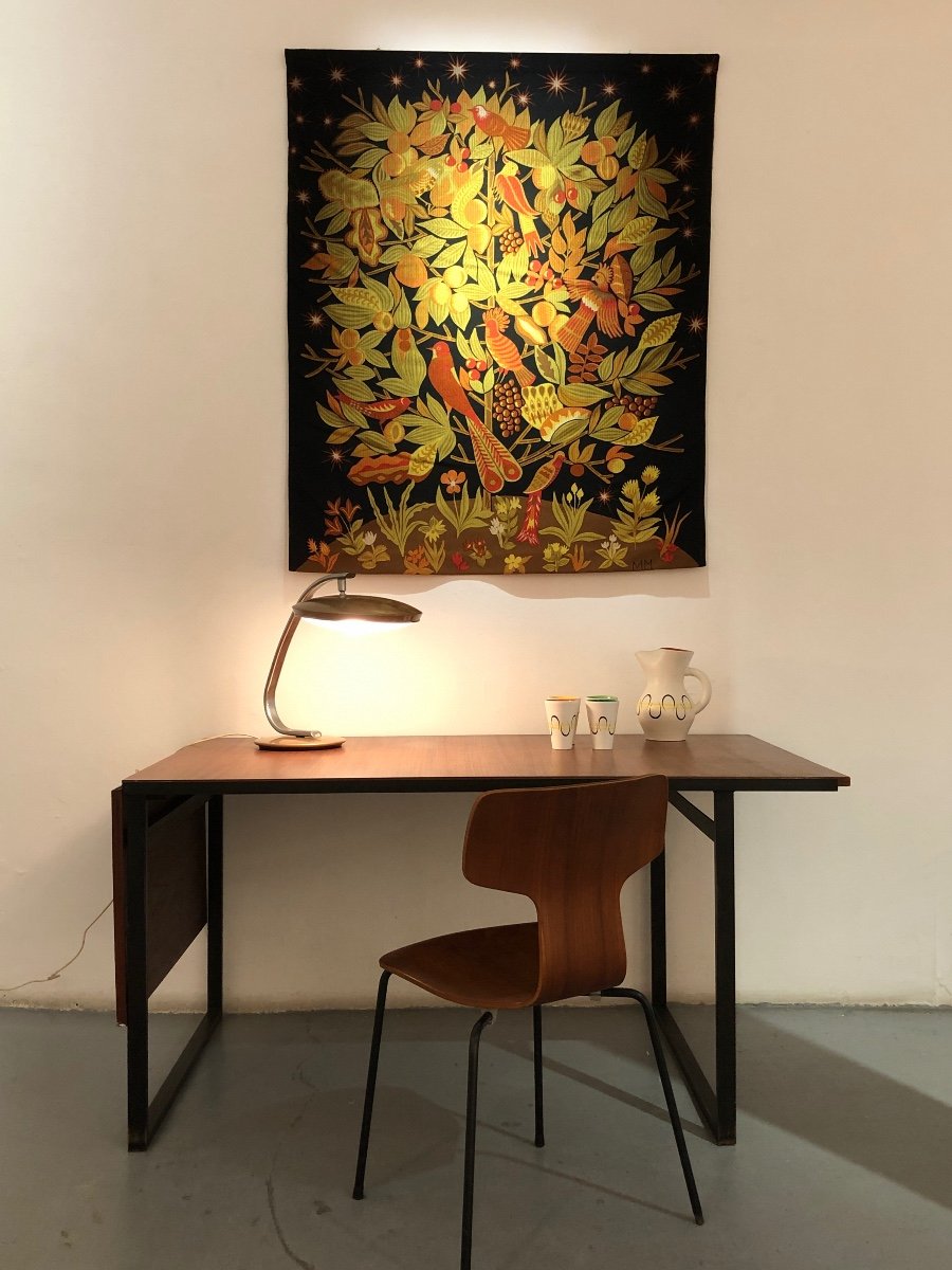 Table/bureau moderniste en bois avec rallonge coulissante.