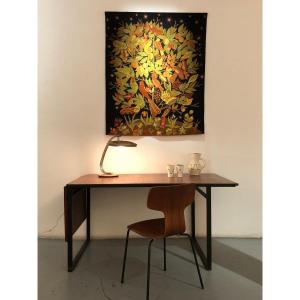 Table/bureau moderniste en bois avec rallonge coulissante.