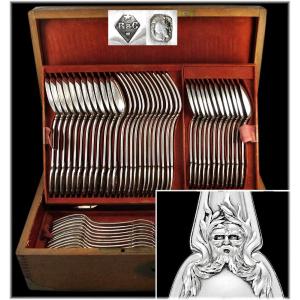 RISLER & CARRE : Ménagère en Argent Massif Mascarons / Greenman 50 pièces - Coffret Chêne