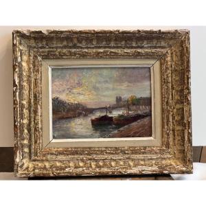 Tableau la Seine  Notre-Dame au Loin,  Signé illisible Huile sur bois  beau cadre. 