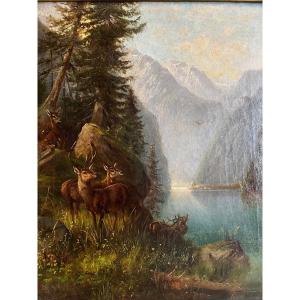 Landscape Painting With Deer And Does By A Lake, Signed Christian Johann Kröner 1838-1911.