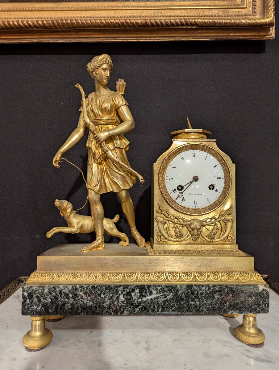 Marble And Gilt Bronze Clock With The Effigy Of Diana From The Consulate-empire Period