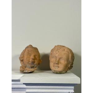 Two Terracotta Children's Heads