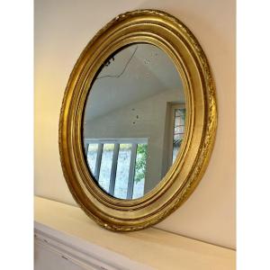 Oval Mirror In Molded, Carved Wood And Golden Stucco. End Of The 19th Century