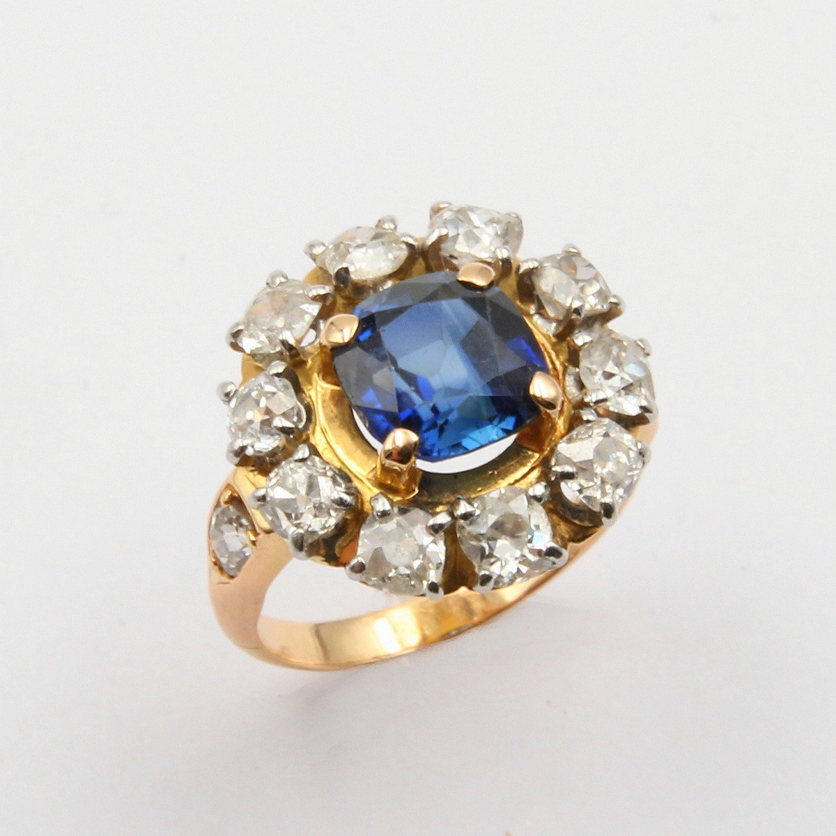 Natural Cushion Sapphire Ring Surrounded By Diamonds