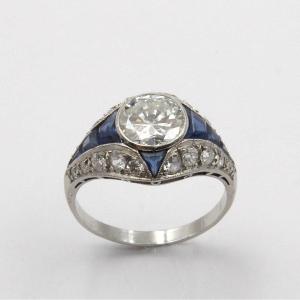 Art Deco Ring With Calibrated Diamonds And Sapphires.