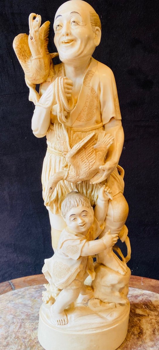 Ivory Okimono Representing A Cormorant Fisherman And A Child Meiji Period (1868-1912)