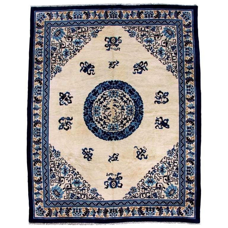Large Chinese Rug Made In Wool, Antique From The 20th Century.
