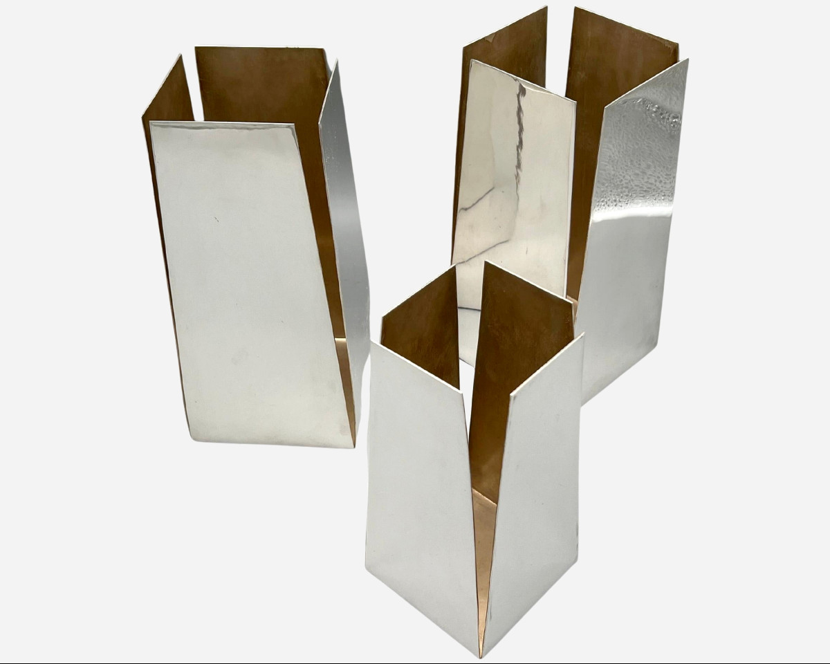 Trois cache-bouteilles en métal argenté, Éditions Lancel, Paris, France, vers 1970